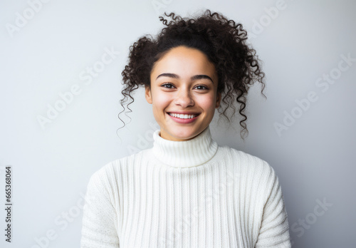 Portrait of a smiling young woman looking at the camera