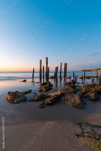 Beautiful dusk view of Port Willunga jetty pylons, Adelaide, South Australia.