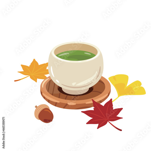 湯呑み茶碗に入ったお茶　紅葉付き