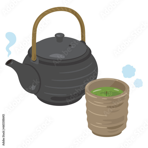 湯呑み茶碗に入った茶柱の立ったお茶と急須