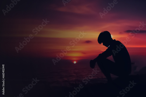 silhouette of a person on a sunset