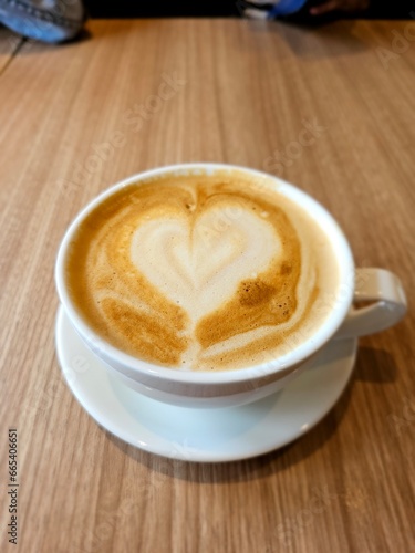 a cup of cappuccino with love art