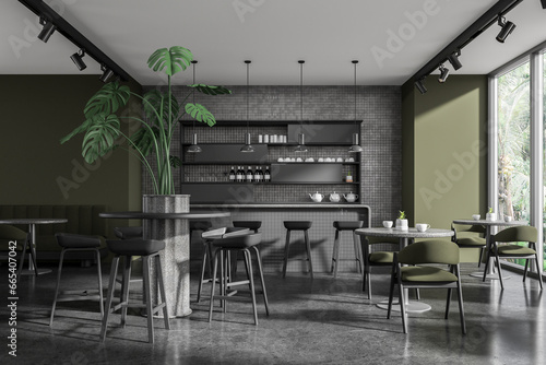 Green and gray cafe interior of bar and sofa © ImageFlow