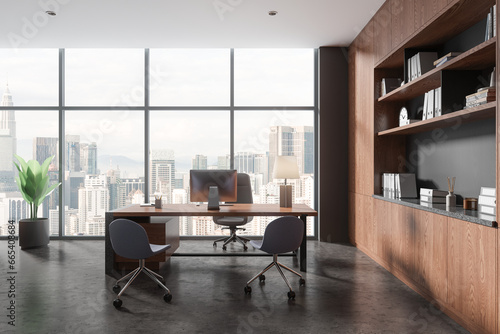 Gray and wooden CEO office interior with bookcase