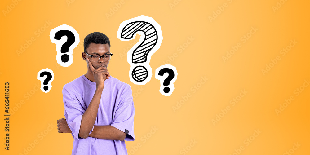 Pensive African man college student and question marks - obrazy, fototapety, plakaty 
