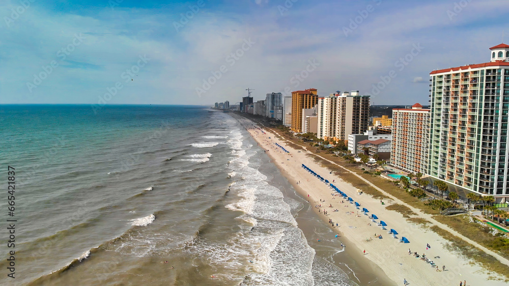 Myrtle Beach from drone, South Carolina. City and beach view at dusk Myrtle Beach from drone, South Carolina. City and beach view at dusk