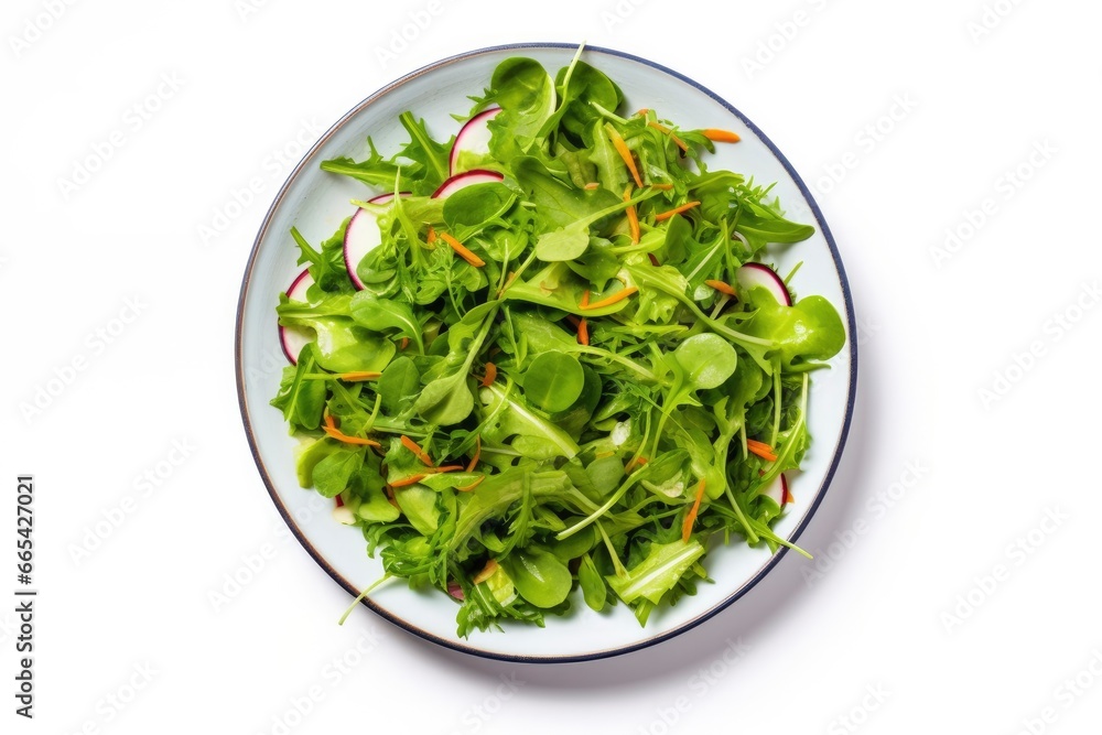 Healthy fresh green salad plate shot from above on white background. Healthy fresh green salad plate shot from above on white background.