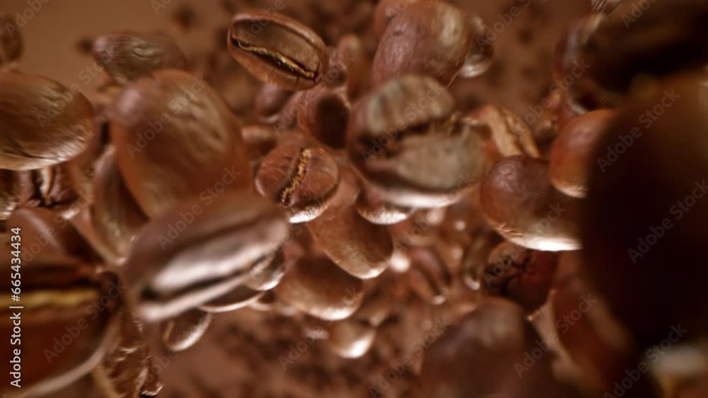 Super Slow Motion Detail Shot of Coffee Beans Flying Towards Camera at 1000fps. Super Slow Motion Detail Shot of Coffee Beans Flying Towards Camera at 1000fps.
