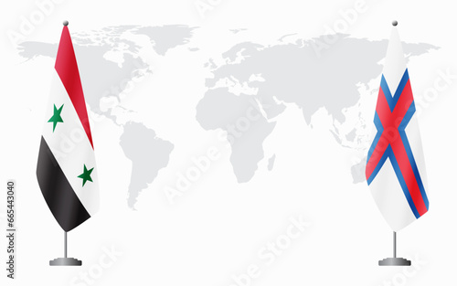 Syria and Faroe Islands flags for official meeting