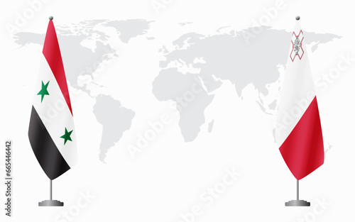 Syria and Malta flags for official meeting