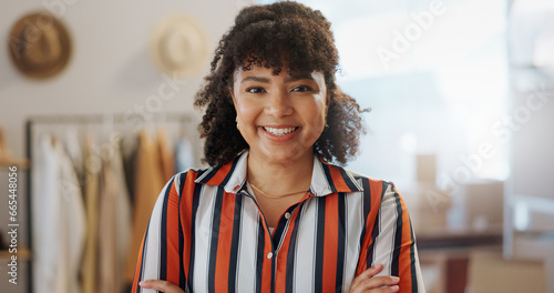 Portrait, business woman and confident fashion designer in boutique, clothes store or startup shop. Smile, face of tailor and professional, entrepreneur and creative worker or owner in South Africa