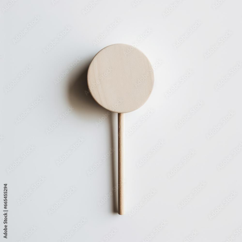 Minimalist Round Label on Stick Flatlay on White Background Minimalist Round Label on Stick Flatlay on White Background