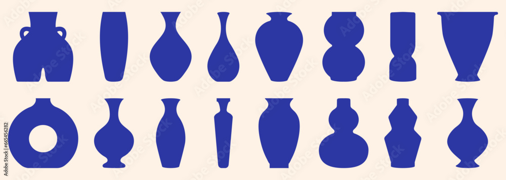 Set of vases with different shapes and forms. Dark blue colored geometric pottery Set of vases with different shapes and forms. Dark blue colored geometric pottery