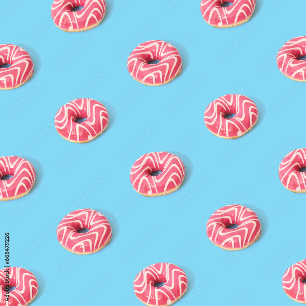 Donuts on blue background. Top view. Pop art design. Donuts on blue background. Top view. Pop art design.
