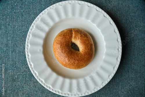 wholegrain bagel in plate