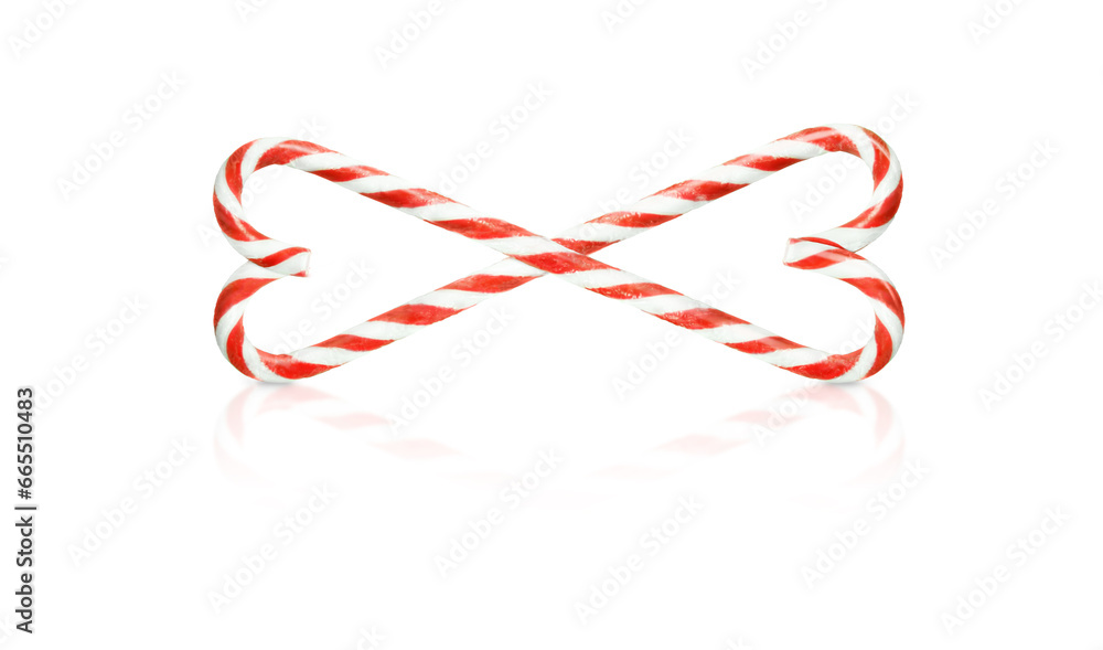 Fototapeta premium Christmas candy canes weave in hearts isolated