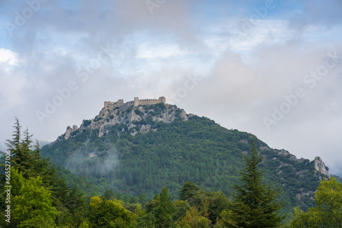 Landscape view of ancient medieval Puilaurens cathar castle ruin on hill, Lapradelle-Puilaurens, Aude, France	
 photo