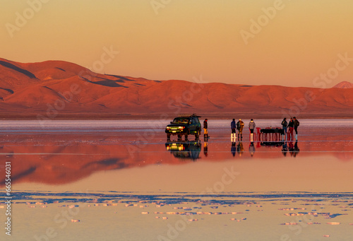 Sunset in the Salar de Uyuni, Bolivia, reflection in the salts, Sunset and the mountains in the background, beauty of that beautiful place. August 16, 2023