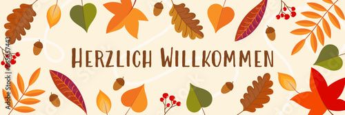 Herzlich Willkommen - Schriftzug in deutscher Sprache. Grußkarte mit bunten Blättern, Eicheln und Beeren.