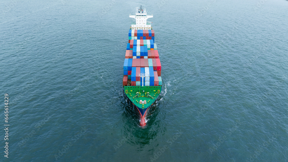 Aerial front view of cargo container ship carrying container box running for export concept technology logistics freight shipping and service transportation Aerial front view of cargo container ship carrying container box running for export concept technology logistics freight shipping and service transportation