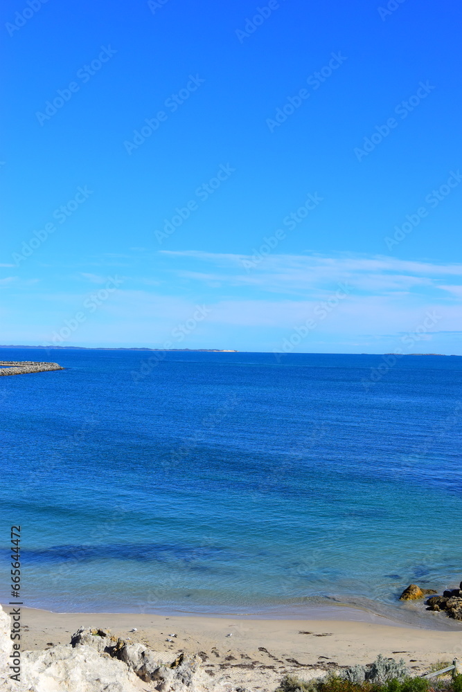 The sea and beach at Cottesloe Beach Western Australia. September 2022. Beautiful golden sand and beautiful blue skies and turquoise waters. 