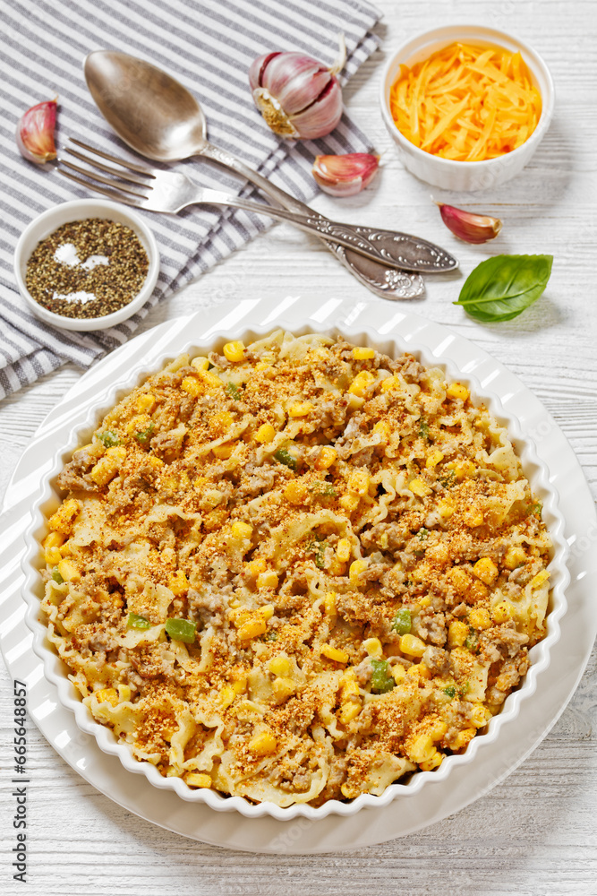 Creamy Corn Casserole with Sausage in baking dish Creamy Corn Casserole with Sausage in baking dish