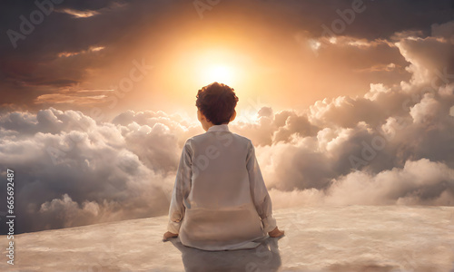 back view of muslim Arab Boy was looking at the sun. concept of peace of war. Peaceful realm of dreams. golden hour, dreamscape background, sunset