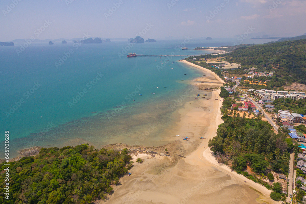 Aerial view blue sea and white long beach at Kwang beach Krabi..scenery white sand beach..Gradient blue sea background. .dramatic nature colorful seascape.