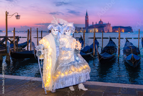 Carnevale di Venezia,Carneval .San Giorgio Maggiore  in the background,.costumes,Venice,Veneto,Italy,Europe, photo
