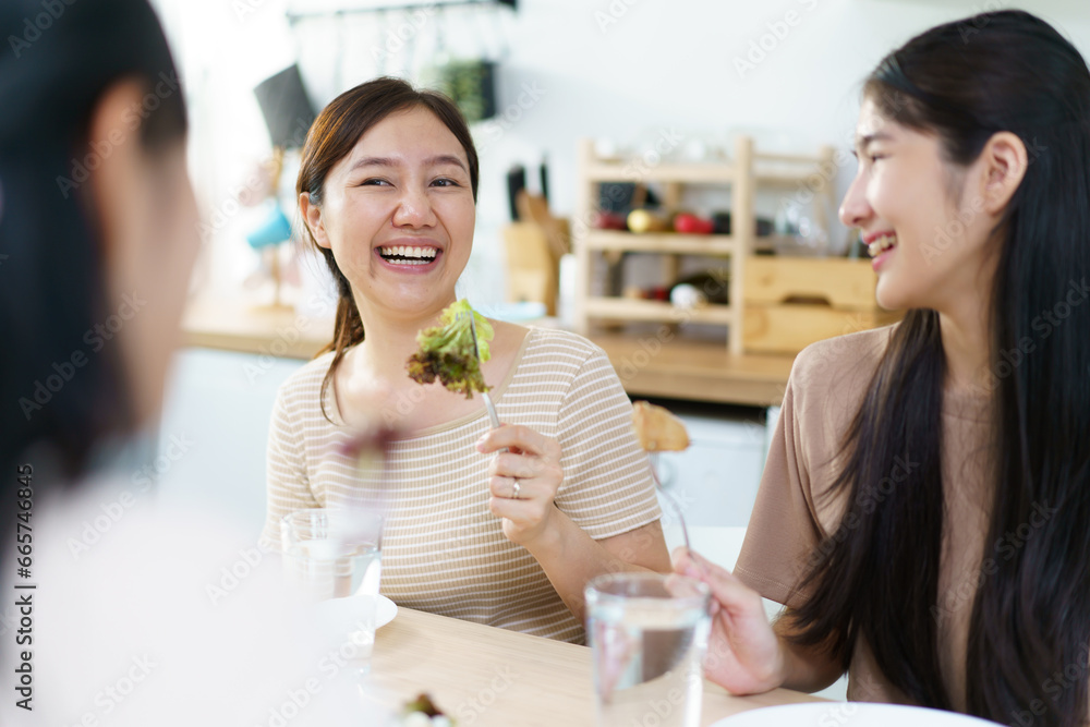Happy Asian man and women enjoy having a launch together. Group of Asian people have a launch. Happy Asian man and women enjoy having a launch together. Group of Asian people have a launch.