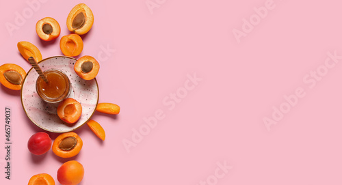 Composition with sweet apricot jam on pink background with space for text, top view