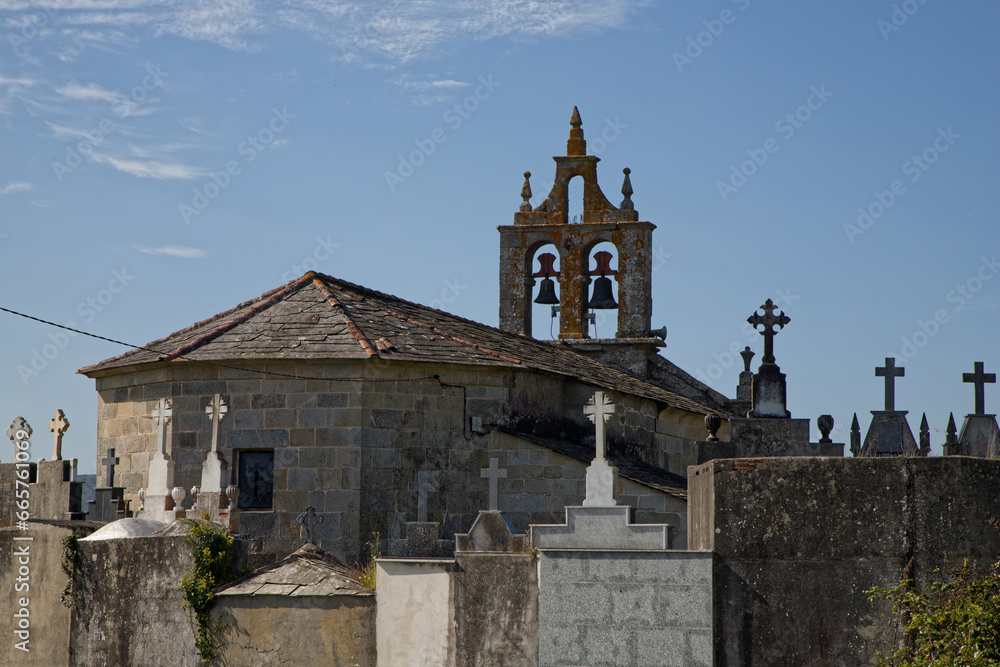 VILLOURIZ, October 4, 2023 : Old church and cemetery of a small village on the road to Santiago