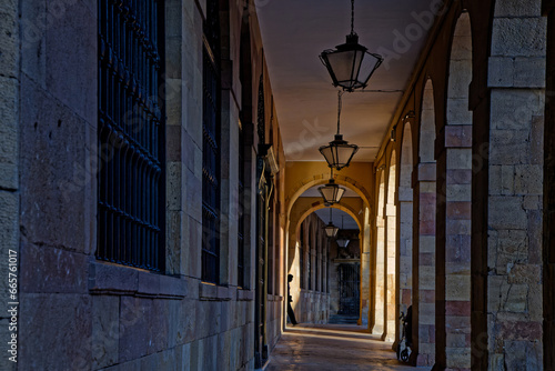 OVIEDO  SPAIN  October 1  2023   Oviedo Town Hall arches on Plaza de la Constitucion at sunset