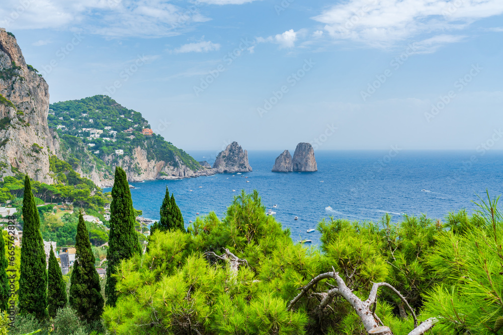 View of Faraglioni Rocks and a Bay of Naples from Capri island, Italy