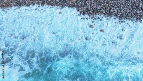 Beach, waves, rocks and coastal landscape in La Tablía in the area of the town of Suances. Aerial view from a drone. Suances Municipality. Cantabrian Sea. Cantabria. Spain. Europe photo