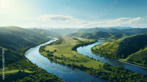 A meandering river flows through a lush, green valley, surrounded by rolling hills and distant mountains The sky is a brilliant, deep blue, and the sun is shining brightly