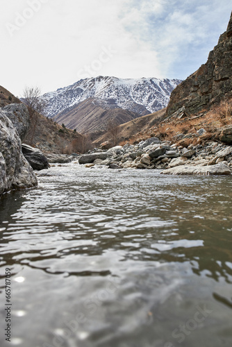 Foto Ripples of water in a mountain stream