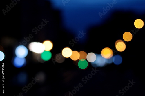 city lights at night, bokeh background © Sabineyro