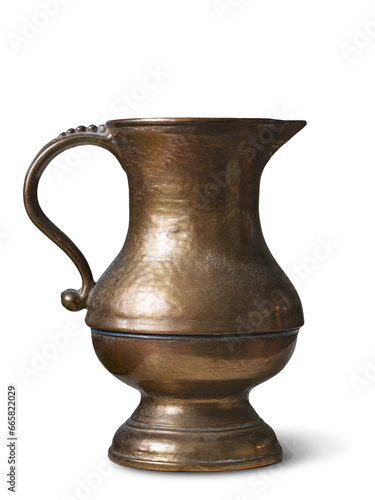 copper or brass antique handmade jug, isolated on a white background