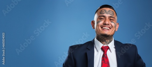 Young Latino businessman with neck and face tattoos smile face portrait
