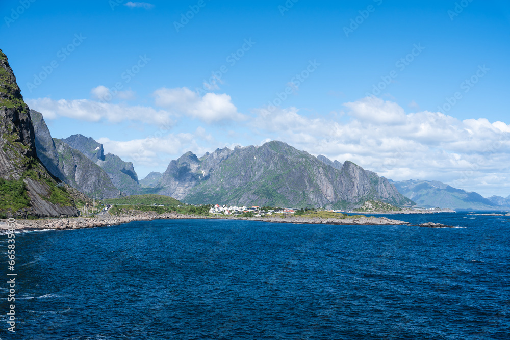 Summer sunny day at Lofoten, Norway, Nordland. Landscape with dramatic mountains and sea, ocean. fjord in the Lofoten Islands
