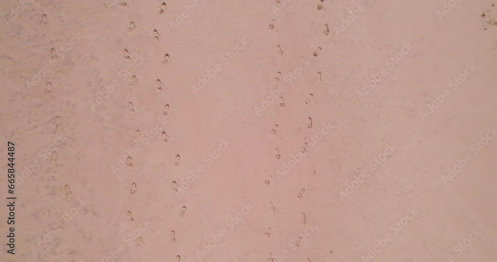 Footprints on a sandy beach