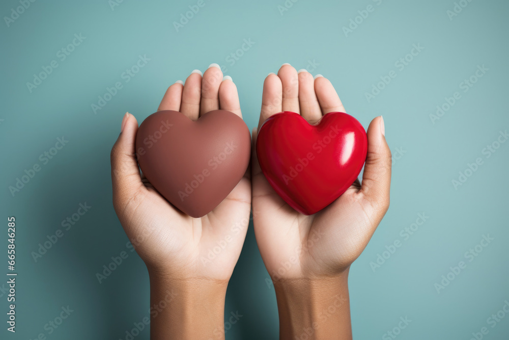 A duet of hearts cradled in palms , signifying unity, affection, and support for World AIDS Day A duet of hearts cradled in palms , signifying unity, affection, and support for World AIDS Day