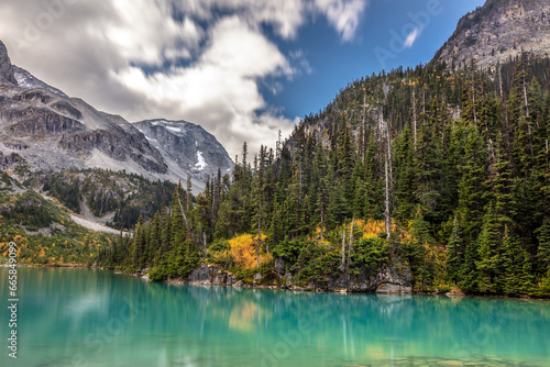 A hint of Autumn colors at the spectacular Joffre lakes with their turquoise color in the wilderness of British Columbia, Canada