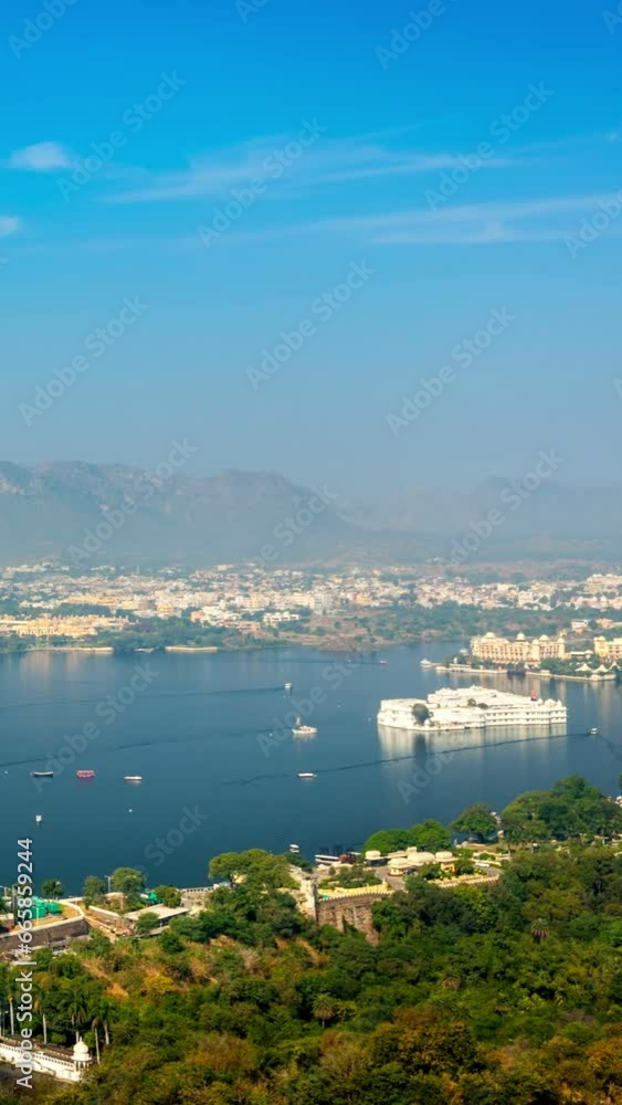 Timelapse of aerial view of Lake Pichola with Lake Palace (Jag Niwas) and Jag Mandir (Lake Garden Palace). Udaipur, Rajasthan, India Timelapse of aerial view of Lake Pichola with Lake Palace (Jag Niwas) and Jag Mandir (Lake Garden Palace). Udaipur, Rajasthan, India