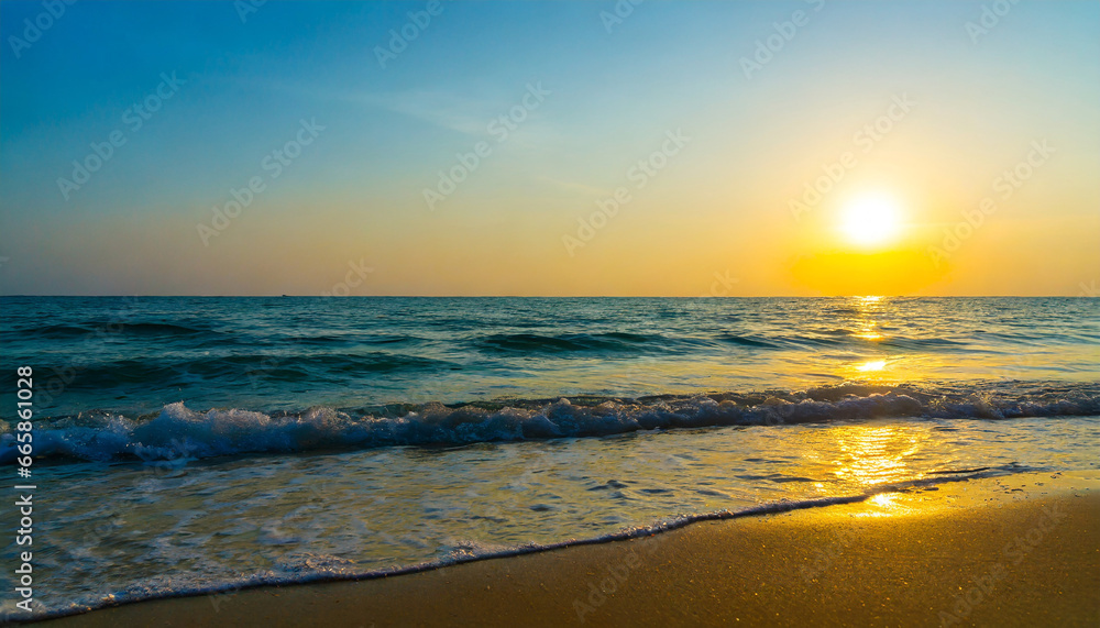 beautiful sunrise over the sea wave and tropical beach shore ocean horizon