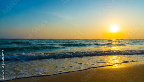 beautiful sunrise over the sea wave and tropical beach shore ocean horizon