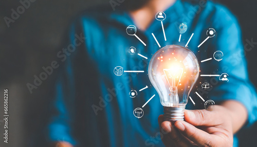 concept of strategy business ideas for innovation planning and planning idea competition business growth strategy economic growth advertising promotion futuristic graphic icon and light bulb photo