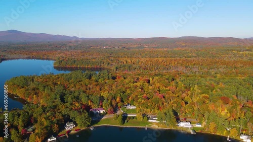 Mirror Lake shore at Lake Winnipesaukee aerial view in fall in town of Wolfeboro, New Hampshire NH, USA.  photo