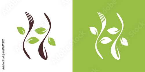 fork and spoon logo design with leaves. organic food design. icon symbol for health restaurant food photo